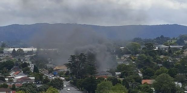 A large, dark plume of smoke can be seen across New Lynn at the moment. Photo: Twitter/@stevenb76