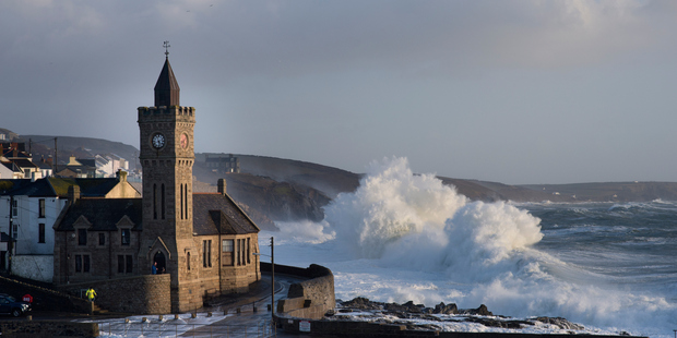 This picture was taken in the fishing port of Porthleven and shows the effects of Storm Imogen. Photo / Getty Images