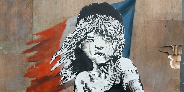 Banksy took aim at France's treatment of those in a migrant camp in Calais. Photo / AP