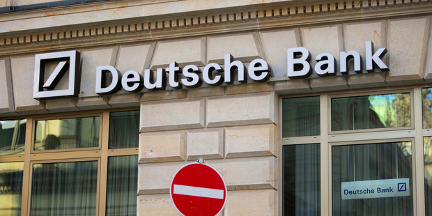 Deutsche Bank AG signage sits on the facade of a branch above a no entry sign, in Hamburg, Germany. Photo / Bloomberg