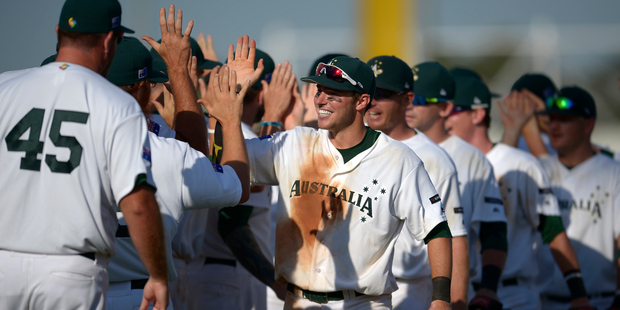 Trent Oeltjen of Australia celebrates victory with team mates during the WBC qualifiers. Photo / Getty Images
