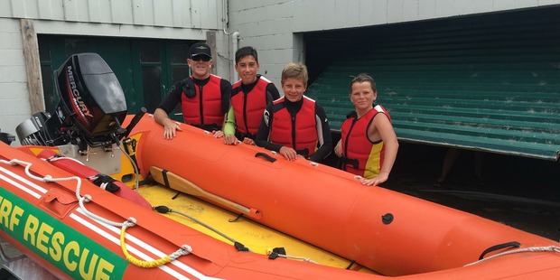 Members of the Taylors Mistake Surf Life Saving Club: L-R: Patrol captain Craig Jamieson, Zach Goldsmith (not involved in the cliff exercise today), Macka Ellis and Will Jamieson. Photo / Supplied