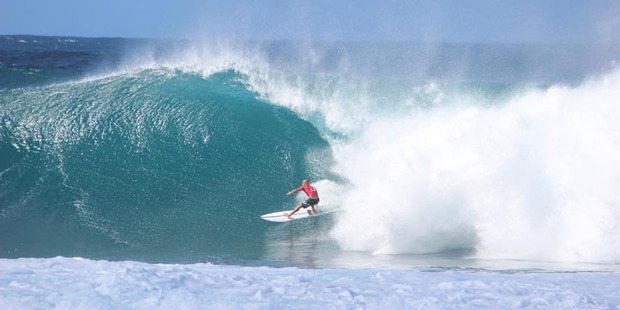 A pro surfer at the Pipeline Masters in Hawaii. Photo / Grant Bradley