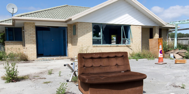 Abandoned homes stand awaiting demolition. Photo / Mike Scott