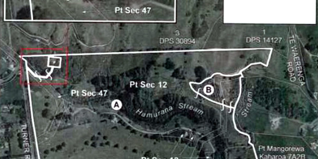 The small white box within the red area is land which will be returned to Ngati Rangiwewehi.