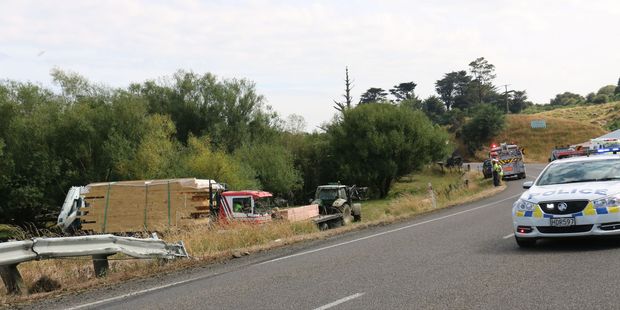The fully laden truck that, with trailer unit, was nudged off the road when it collided with the bridge guard rail. PHOTO/HAYLEY GASTMEIER