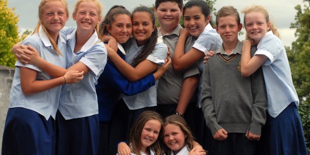 Year 9 twins include Danielle and Rebecca Rose (back left), Aliyah and Shana Beneke, TJ and Ariana Sutton, and Oscar and Ella Southey. In front are Jessica and Danielle Mason. PHOTO/NATHAN CROMBIE