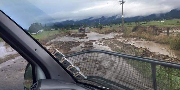 The road leading to the flooded house is completely washed out. Photo / Te Akauroa Miki