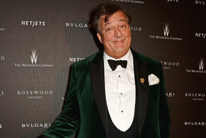 BAFTA host Stephen Fry hit out at critics on Twitter who labelled his 'bag lady' call offensive. Photo / Getty