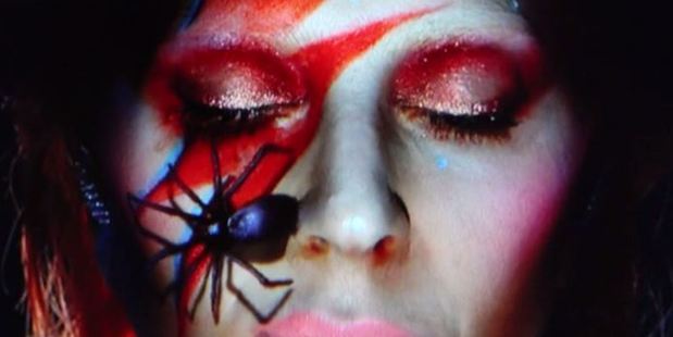Visual effects during Gaga's tribute to David Bowie included signature lightening bolt and spider images.