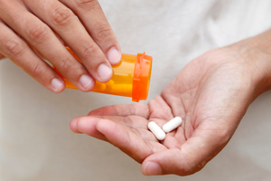 A caregiver was distracted by another resident when conducting the morning medication round at the rest home. Photo / iStock