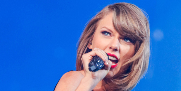 Taylor Swift stood up to Kanye West in her Grammys acceptance speech after he made derogatory comments about her in his new song, Famous. Photo / Getty