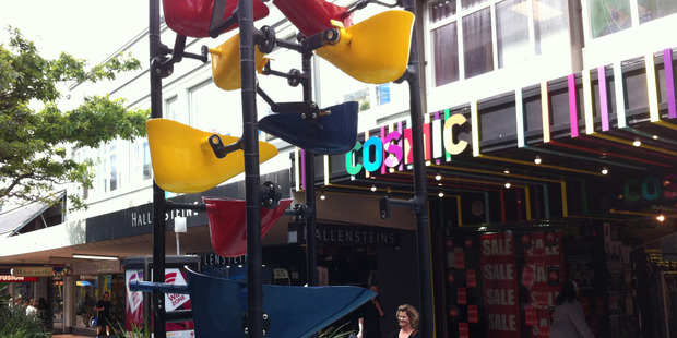 A yellow bucket is missing from the bucket water sculpture in Cuba Street Wellington. Photo / Jimmy Ellingham