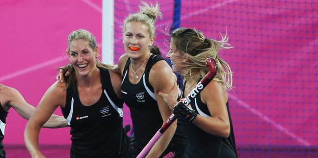 Clarissa Eshuis of New Zealand celebrates after scoring with team mates. Photo / Getty Images