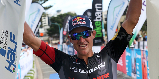 Braden Currie enjoying the victory at the Port Tauranga 1/2 Ironman. Photo / Getty Images