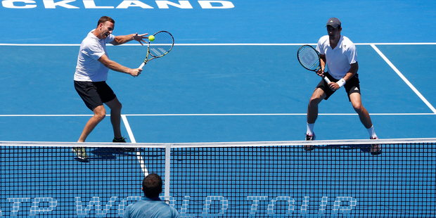 Michael Venus of New Zealand (L) plays a backhand with Mate Pavic of Croatia. Photo / Getty Images