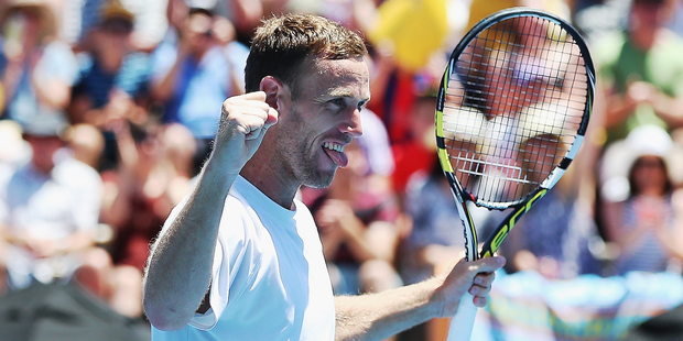 Michael Venus celebrates after winning the men's doubles final at the ASB Classic. Photo / Getty Images