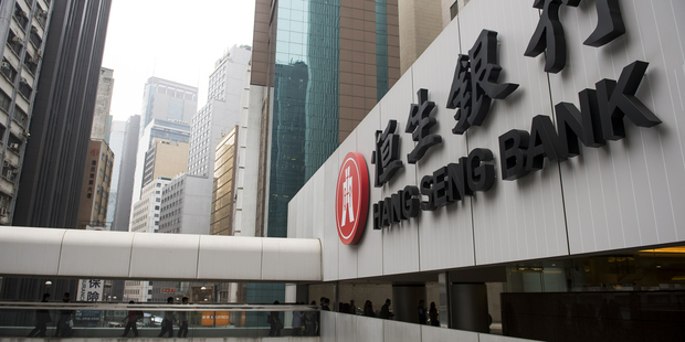 Signage for Hang Seng Bank is displayed outside the bank's headquarters in Hong Kong, China. Photo / Getty Images
