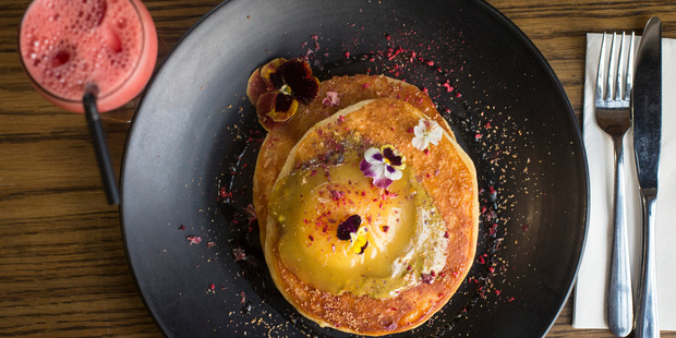 The buttermilk hotcakes with pistachio butter, lemon curd and blood orange crumble. Photo / Jason Oxenham