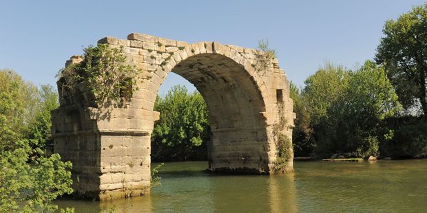 Ambrussum Bridge on the Vidourle River in Languedoc Roussillon, France.