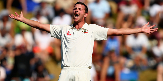 Stump microphones picked up Josh Hazlewood swearing after a controversial verdict from third umpire Richard Illingworth in Christchurch. Photo / Getty Images
