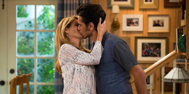 Lori Loughlin and John Stamos in a scene from, Fuller House, streaming on Netflix beginning on Friday, Feb 26. Photo / AP