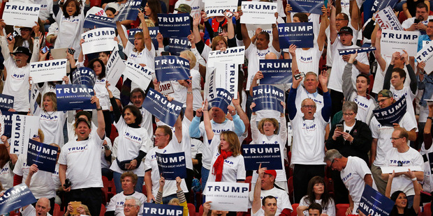 Supporters of Donald Trump cheer. Photo / AP