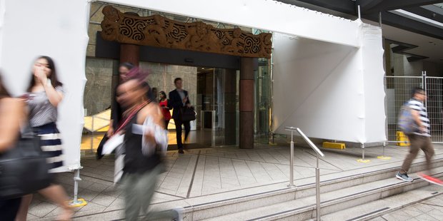 The council building is fenced off with entries covered in wrapping. Photo / Nick Reed