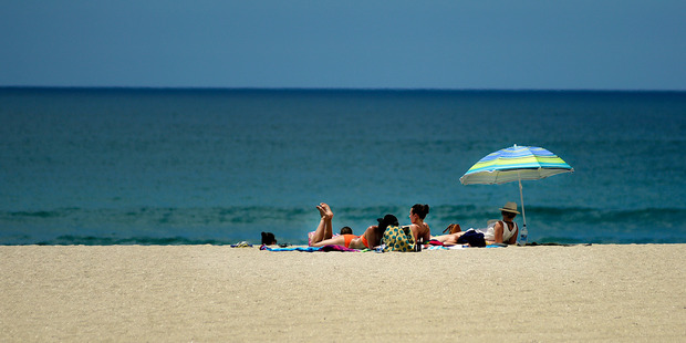 Enjoy the beach, eastern areas in the North Island are cloud free and temperatures are in the early 30s for the next few days. Photo / George Novak