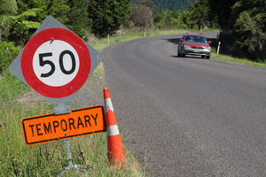 Kaeo's fire chief says cars are travelling too fast on a newly sealed stretch of State Highway 10 where two cars crashed just metres apart, leaving one suspended over a steep drop.
