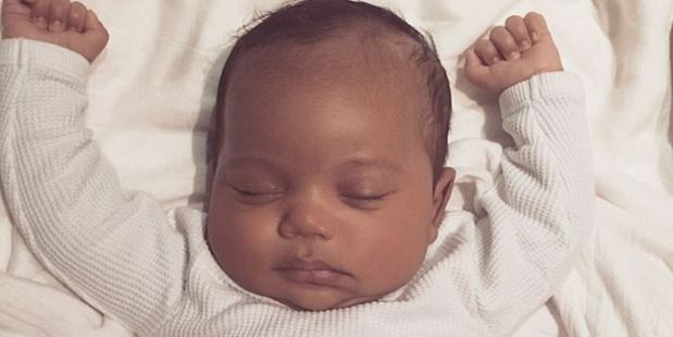 The first picture: Saint West is seen sleeping in an image released by Kim Kardashian. Photo: Kimkardashian.com