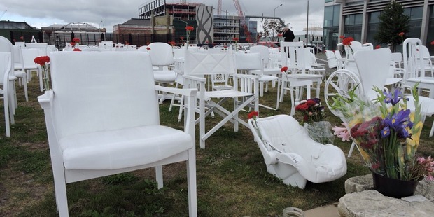 At the white chair memorial, a red flower has been placed on each of the 185 chairs -- the number of people that died on the day. Photo / Supplied