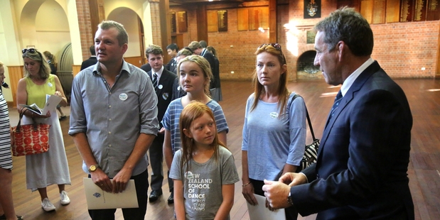 TAKING A TOUR: Wanganui Collegiate headmaster Chris Moller (far right) talks with Simon and Ella Cairncross (left), and Sophie and Bridgit Carver-Vitens during Wanganui Collegiate's open day.PHOTO/BEVAN CONLEY