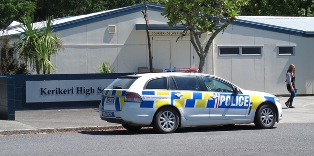 A police patrol car outside Kerikeri High School during yesterday's evacuation. Photo / Northern Advocate