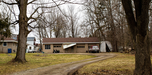 The exterior of Jason Brian Dalton's residence is seen on the corner of West East Avenue and Douglas Avenue in Cooper Township, Mich. Photo / AP