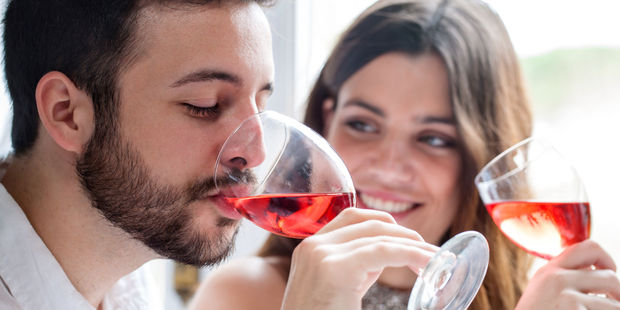 Men are a bad influence on their other halves when it comes to alcohol consumption. Photo / 123RF