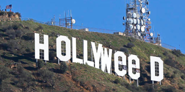 Los Angeles residents awoke New Year's Day to find a prankster had altered the famed Hollywood sign. Photo / AP