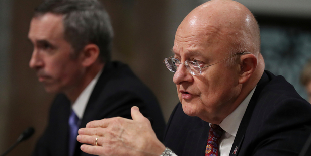 Director of National Intelligence James Clapper, right, with Defense Undersecretary for Intelligence Marcel Lettre II, testifies on Capitol Hill in Washington. Photo / AP