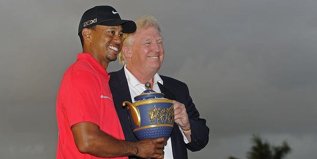 Tiger Woods poses with the Gene Sarazen Cup after winning the World Golf Championships Cadillac Championship in 2013. Photo / Getty Images