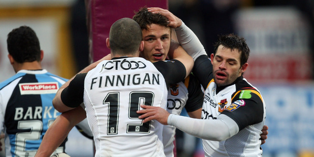 Sam Burgess celebrates after scoring a try while playing for Bradford. Photo / Getty Images