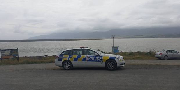 A search and rescue operation is underway for a man who has been washed out to sea at Lake Ferry. Photo / Wairarapa Times Age