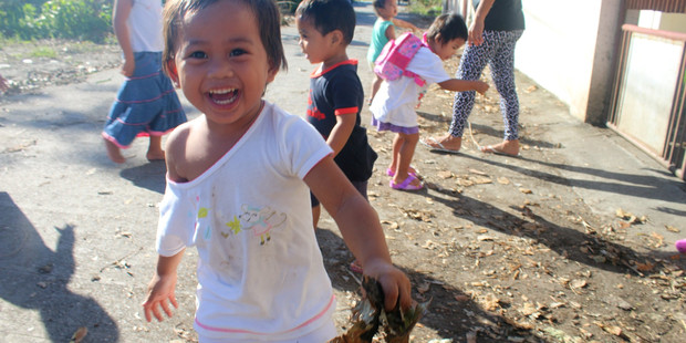 050117ACW02bopDAMAGE: On of the Ruel Foundation orphanage children helping with the clean-up. PHOTO/SUPPLIED