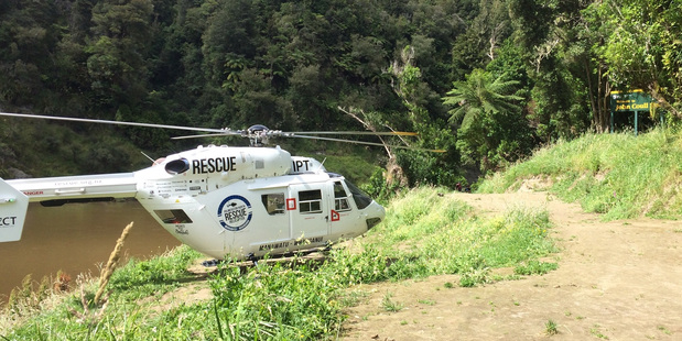 The Palmerston North Rescue Helicopter at the Whanganui River pick up point for the tourist.