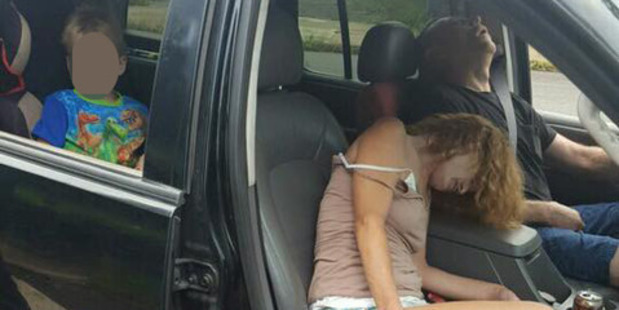 Officials decided to make the photos of the unconscious man and woman public to raise awareness of the heroin epidemic in the state. Photo / East Liverpool Police department