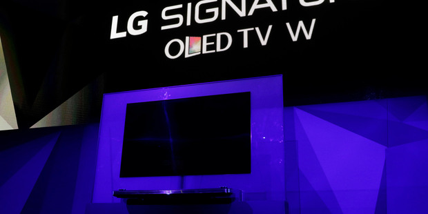 The LG Signature OLED TV W is unveiled during an LG news conference before CES International. Photo / AP