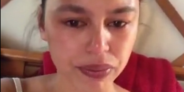 Lara Wharepapa Bridger in a tearful Facebook Live video post in which she alleges Sir Peter Leitch racially abused her. Photo / Facebook
