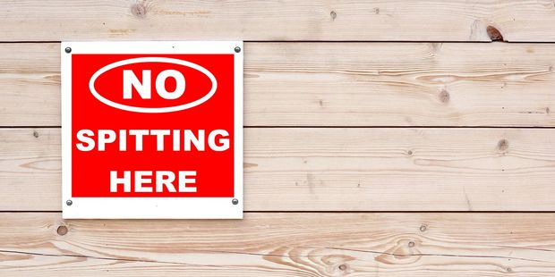 A sign urging Chinese people not to spit is one of the hundreds of racial discrimination complaints made in the last decade. Photo / 123rf