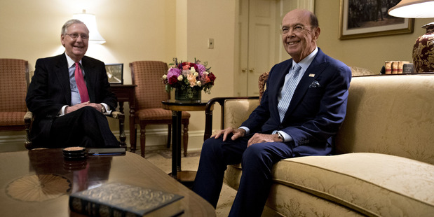 Billionaire investor Wilbur Ross (right), commerce secretary nominee for president-elect. Photo / Andrew Harrer