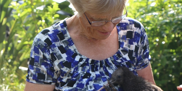 Margaret Mullin has a cuddle with Hori before she is released