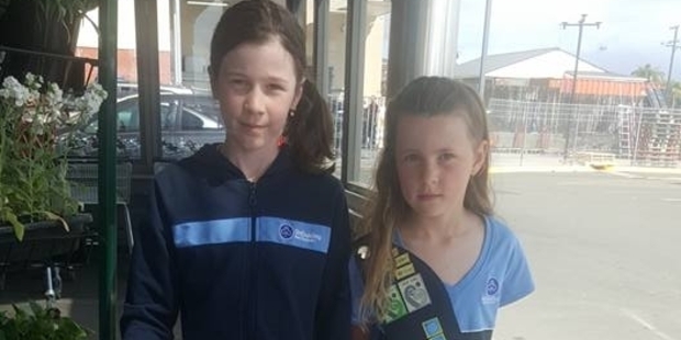 Morgan and Madeline Hobo were out selling Girl Guide biscuits on the weekend